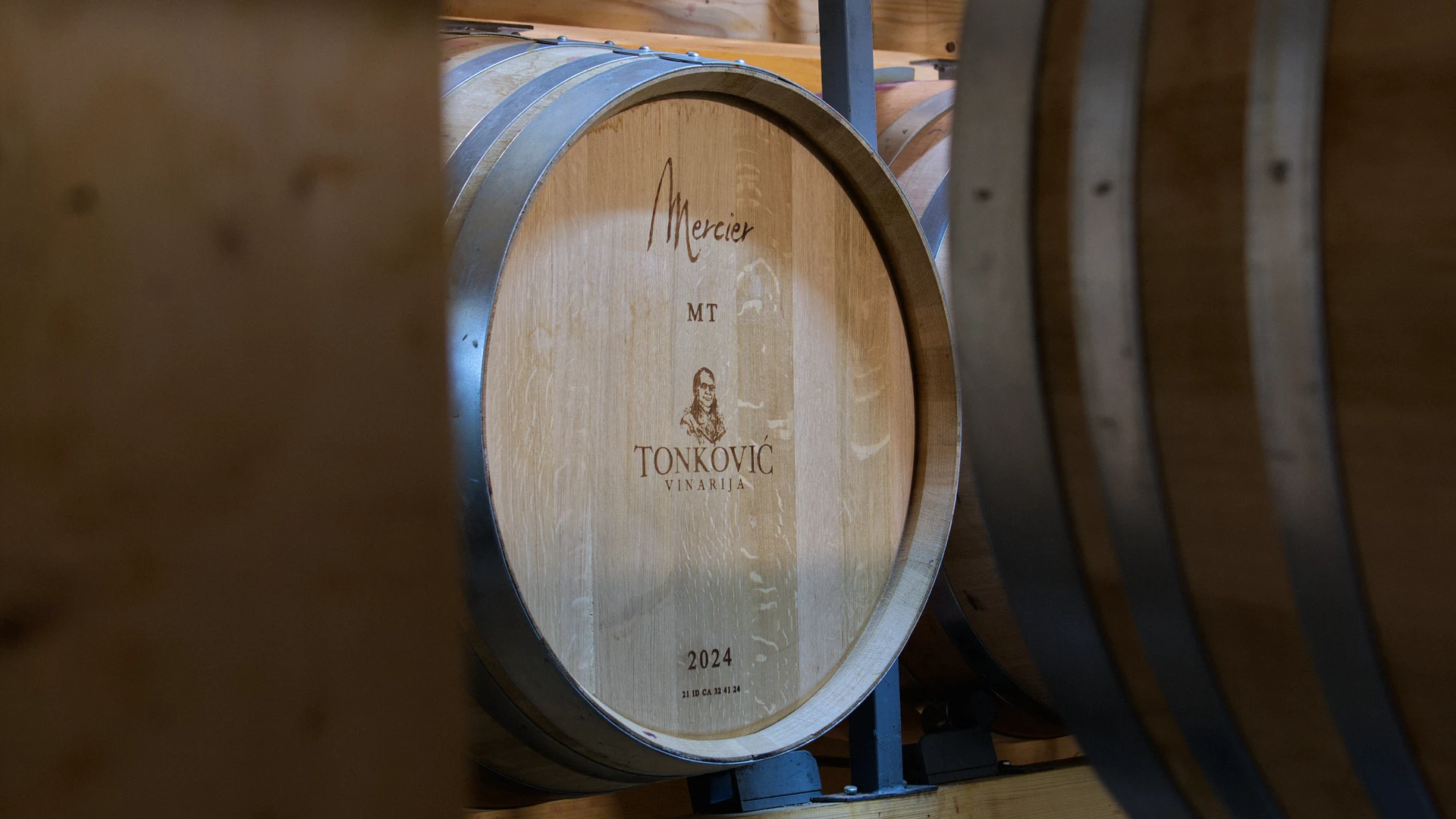 Oak barrel with the Tonković Winery mark